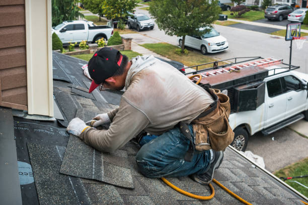 Professional Roofing technician working in Clontarf, MN